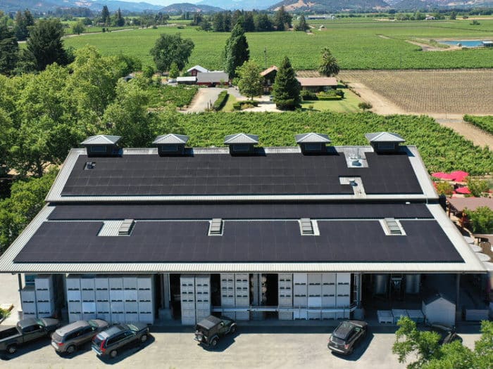 View of top of winery with cars worked outside