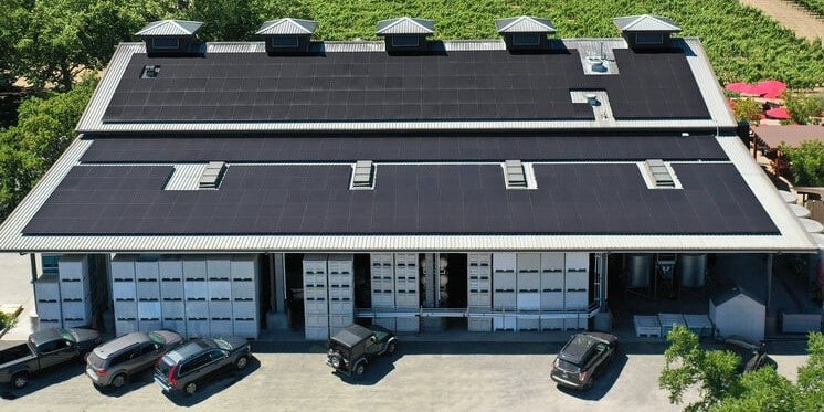 View of top of winery with cars worked outside