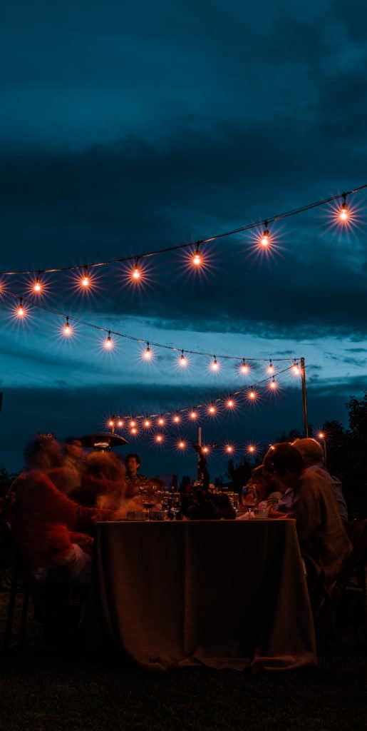 Night blue sky with string lights shining