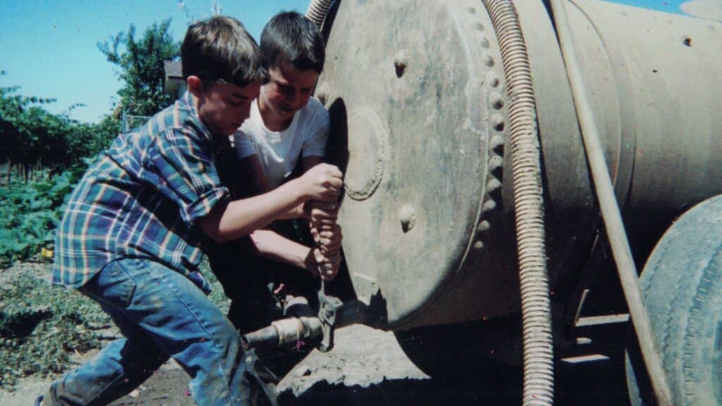 Alex Biale and a friend working at the winery